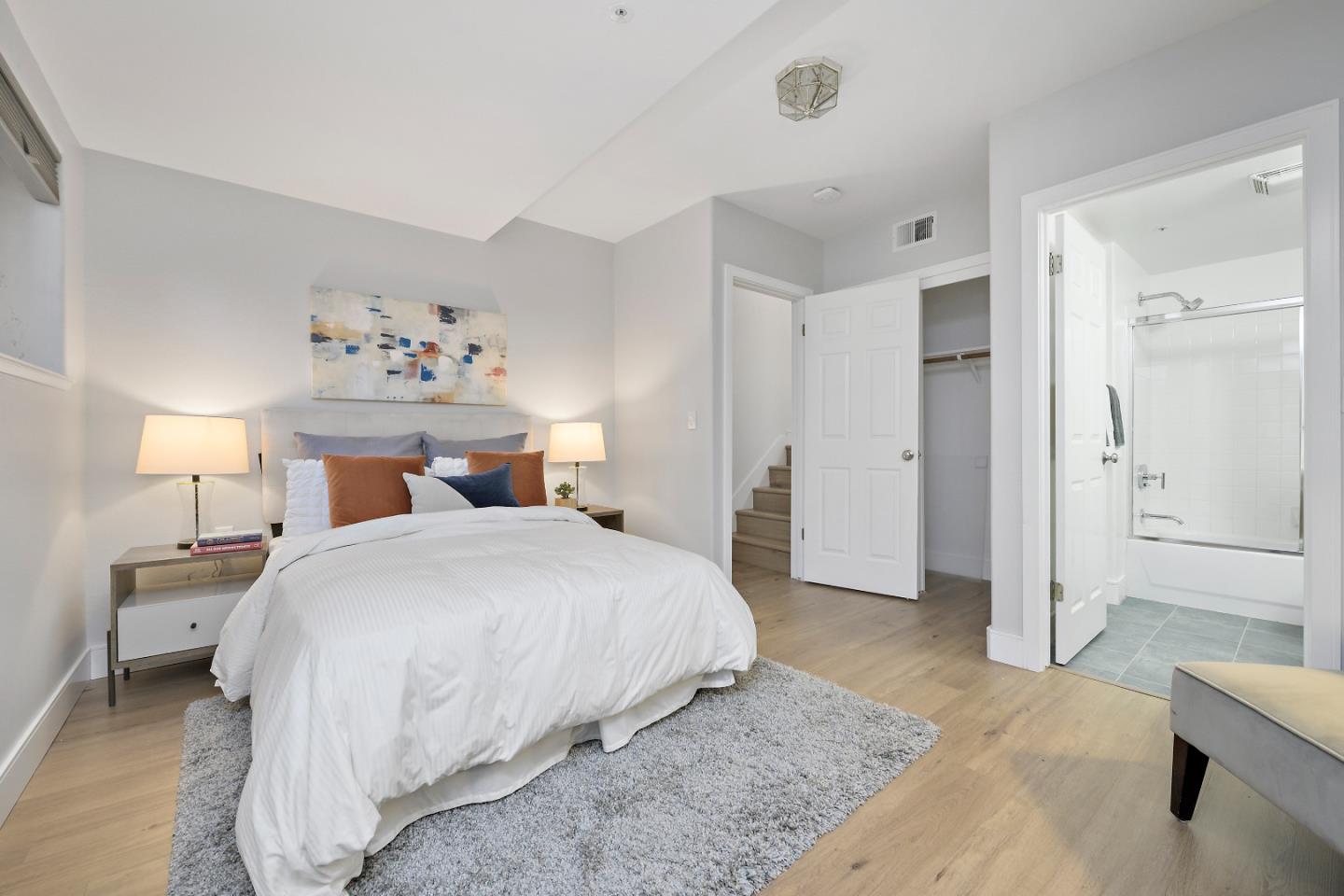 135 Pacchetti Way Mountain View, CA 94040 - Photo 17 of 27 a bedroom with a bed and a table