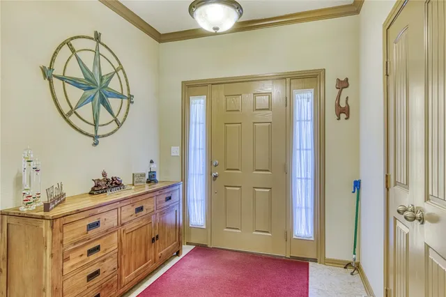 a spacious bathroom with a mirror and a sink