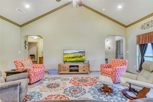 a living room with furniture and a couch