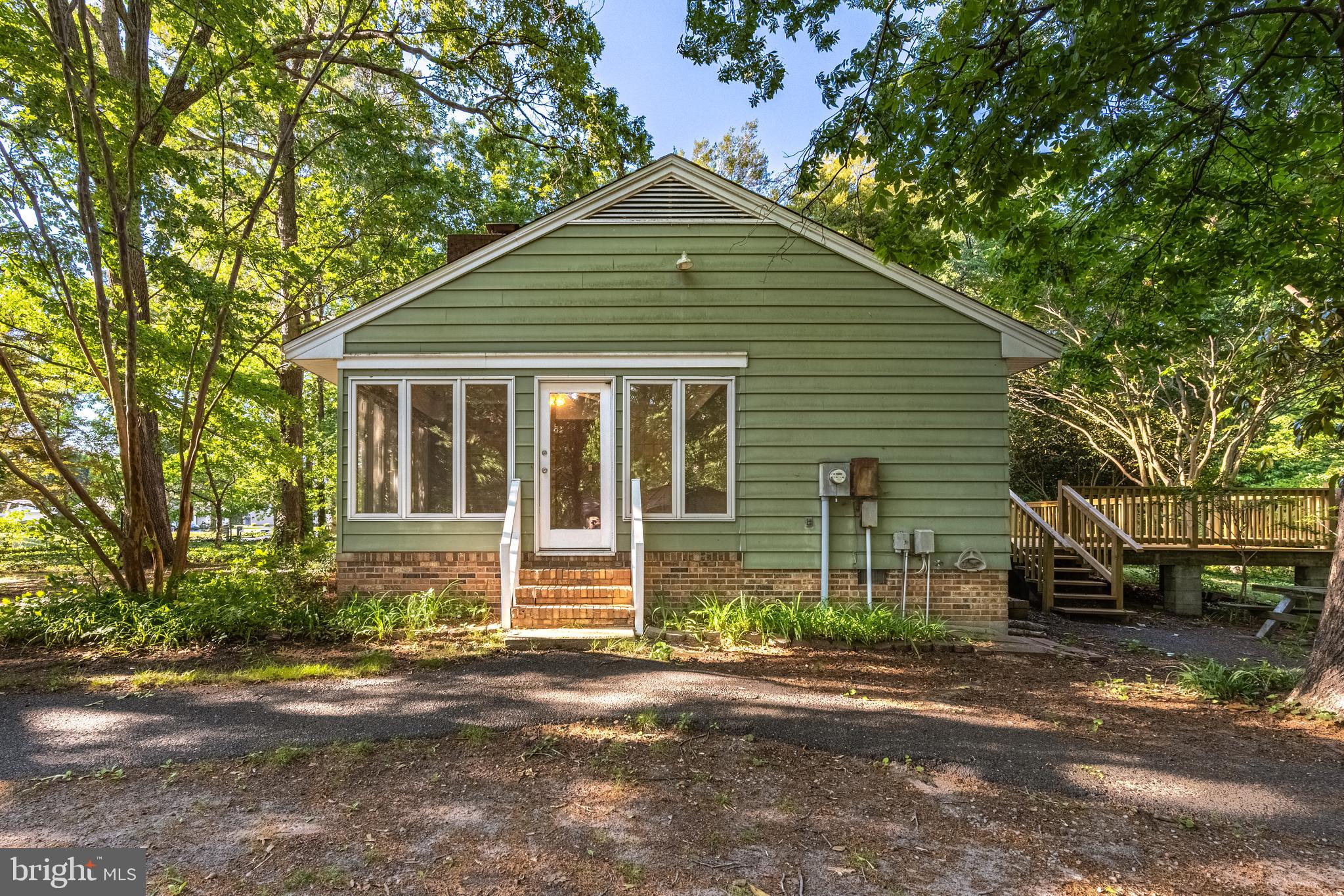 6181 Rockawalkin Road Salisbury, MD 21801 - Photo 43 of 65 a front view of a house with a yard