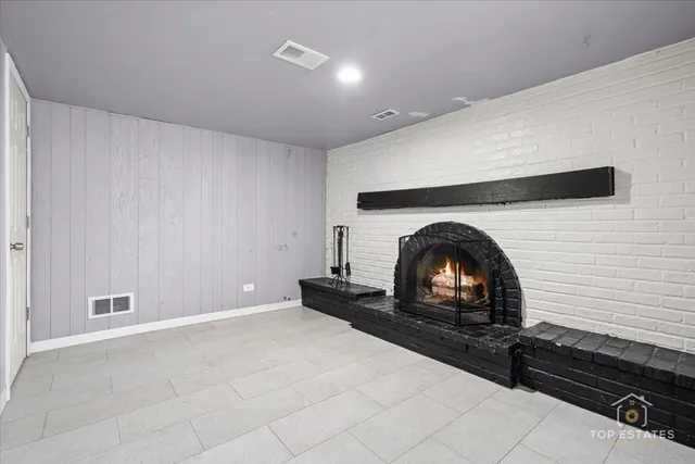 a living room with a fireplace