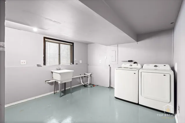 a view of a room with dryer and washer