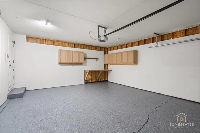 a view of a storage & utility room with wooden floor