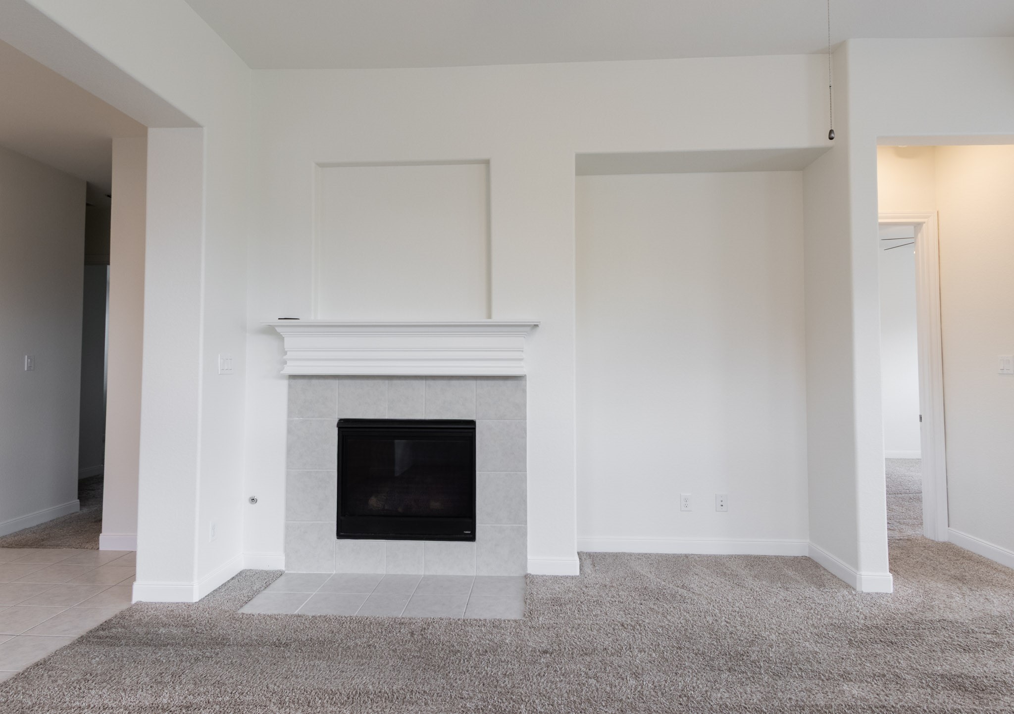 2312 Jessamine Heights Lane Pearland, TX 77089 - Photo 14 of 49 a living room with a fireplace
