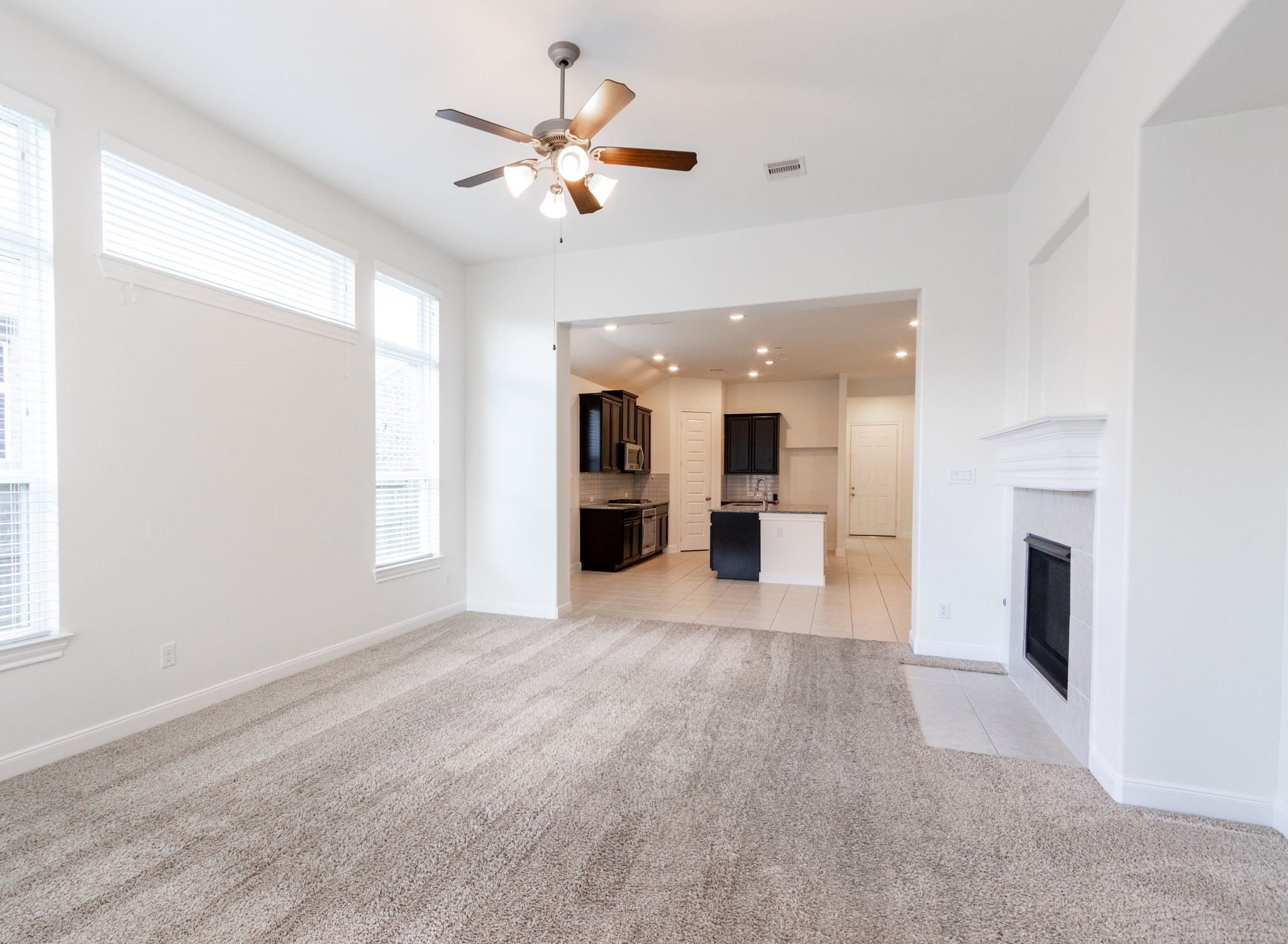 2312 Jessamine Heights Lane Pearland, TX 77089 - Photo 15 of 49 a view of a kitchen with a sink and a kitchen