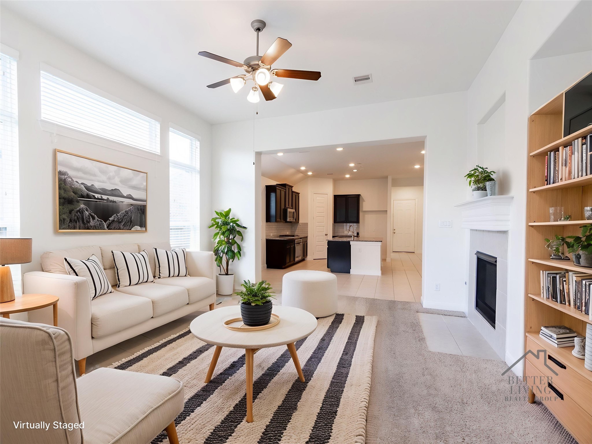 2312 Jessamine Heights Lane Pearland, TX 77089 - Photo 16 of 49 a living room with furniture and a book shelf