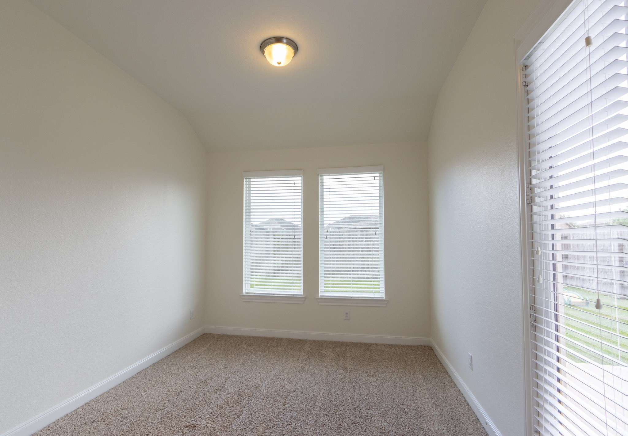 2312 Jessamine Heights Lane Pearland, TX 77089 - Photo 17 of 49 an empty room with a window