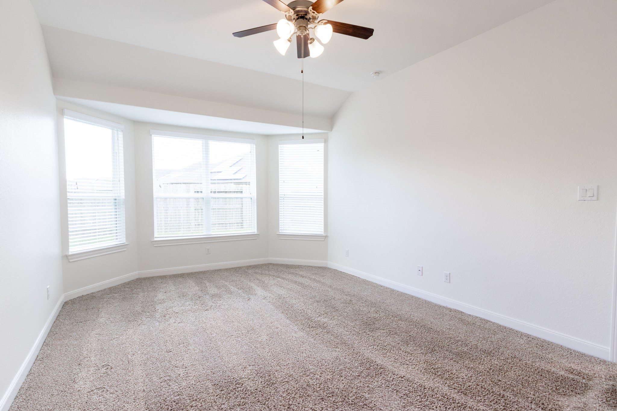 2312 Jessamine Heights Lane Pearland, TX 77089 - Photo 21 of 49 an empty room with a window and a fan