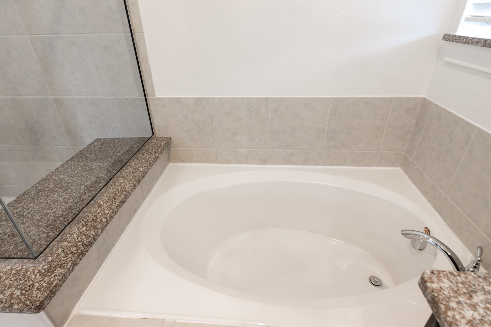 2312 Jessamine Heights Lane Pearland, TX 77089 - Photo 26 of 49 a bathroom with a bathtub