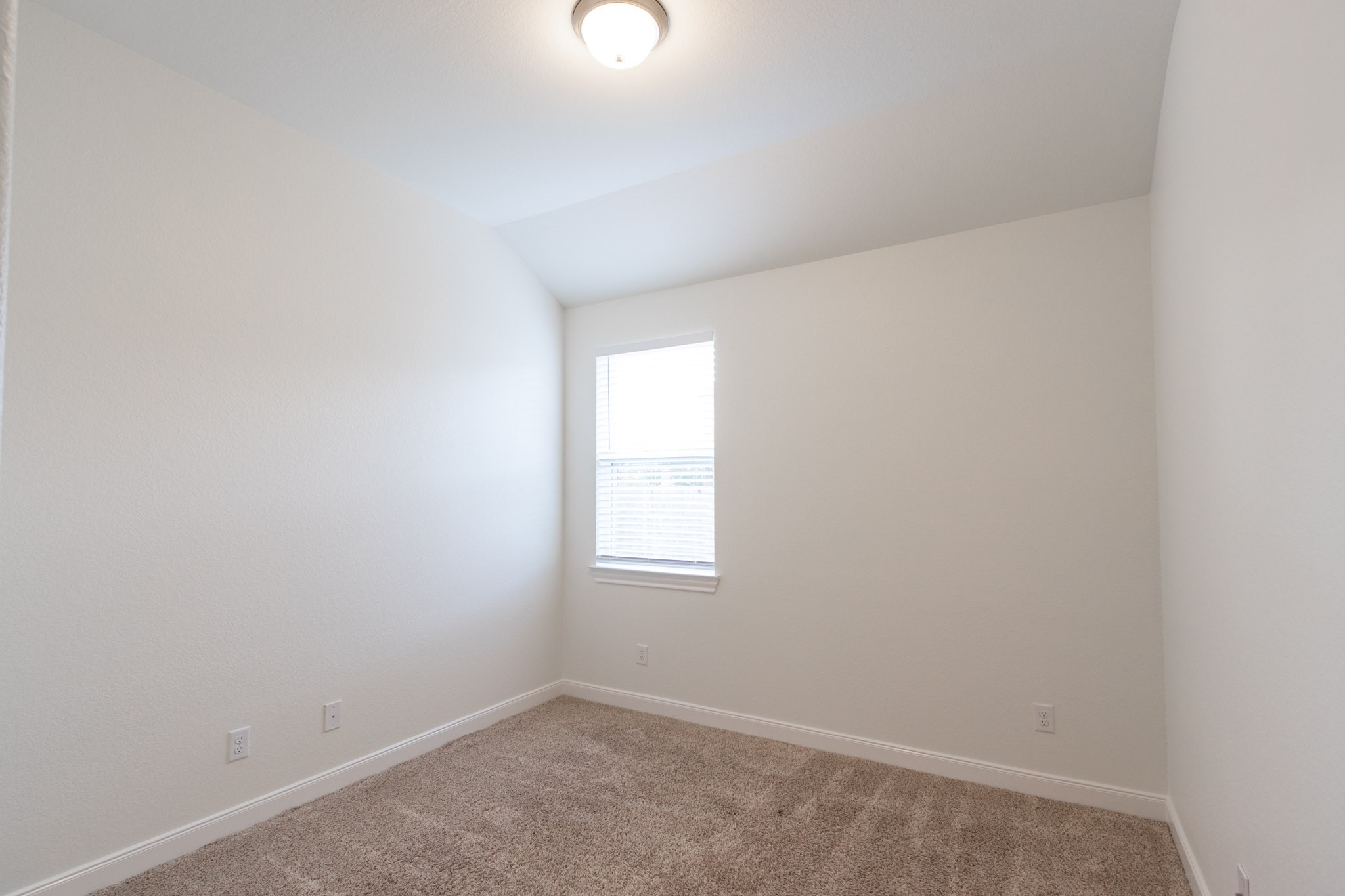 2312 Jessamine Heights Lane Pearland, TX 77089 - Photo 29 of 49 an empty room with a window