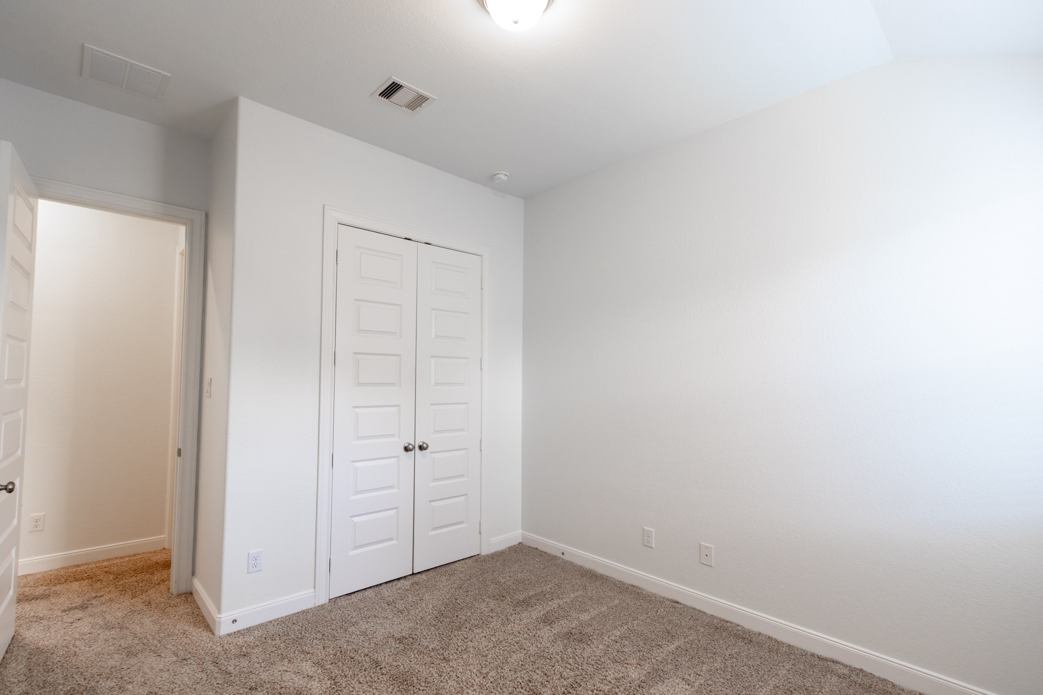 2312 Jessamine Heights Lane Pearland, TX 77089 - Photo 31 of 49 a view of an empty room