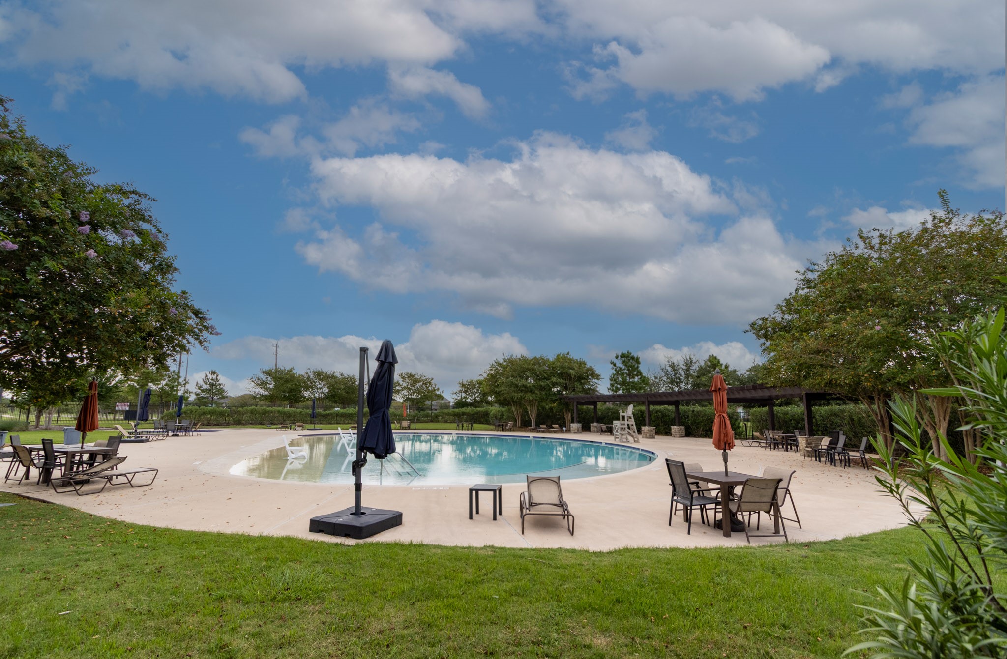 2312 Jessamine Heights Lane Pearland, TX 77089 - Photo 44 of 49 a view of a park with sitting area