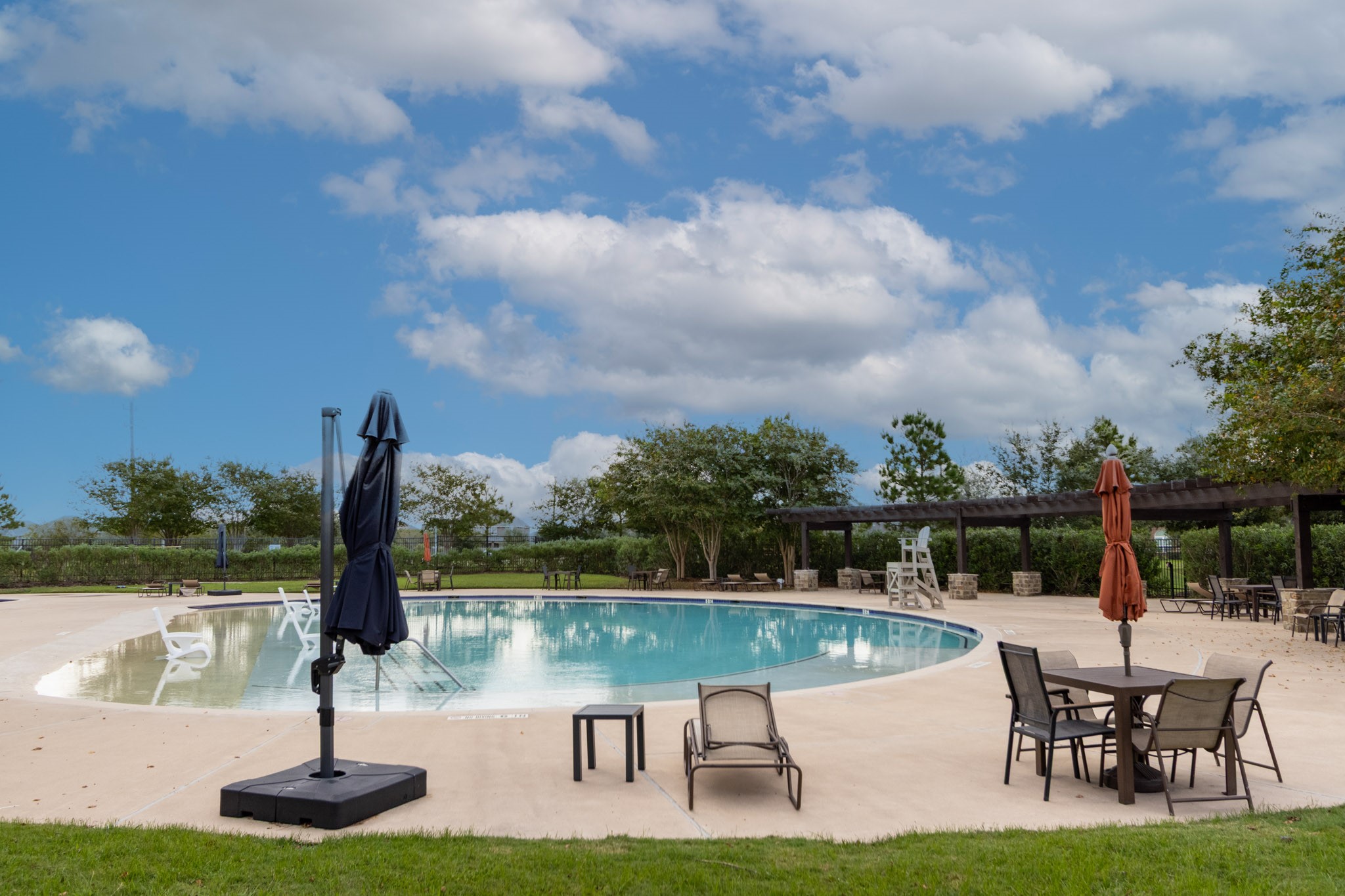 2312 Jessamine Heights Lane Pearland, TX 77089 - Photo 45 of 49 a view of a lake with a yard