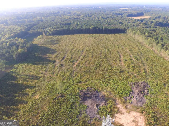 an aerial view of beach and city