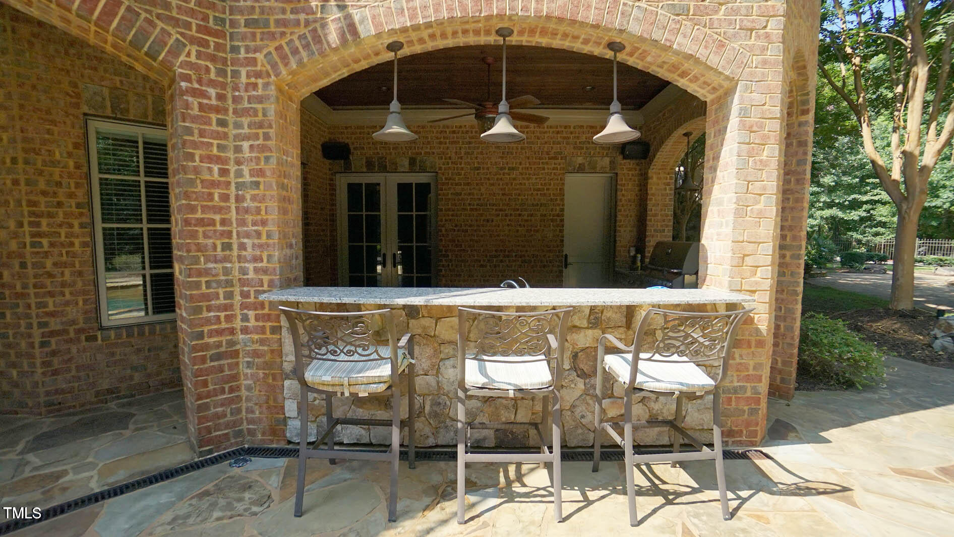 15508 Possum Track Road Raleigh, NC 27614 - Photo 83 of 85 Outdoor Kitchen with Bar Sitting Area