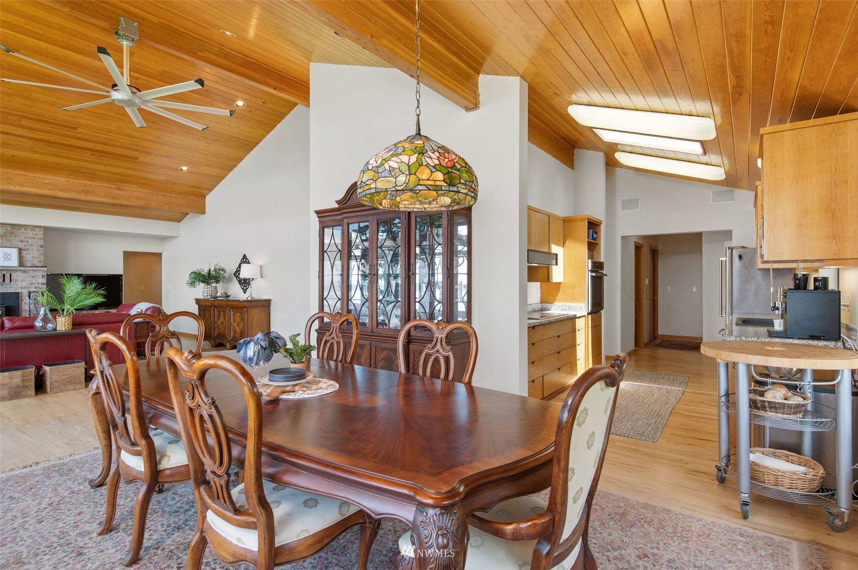 17510 88th Street Southwest Longbranch, WA 98351 - Photo 15 of 40 a view of a a dining room with furniture window and wooden floor