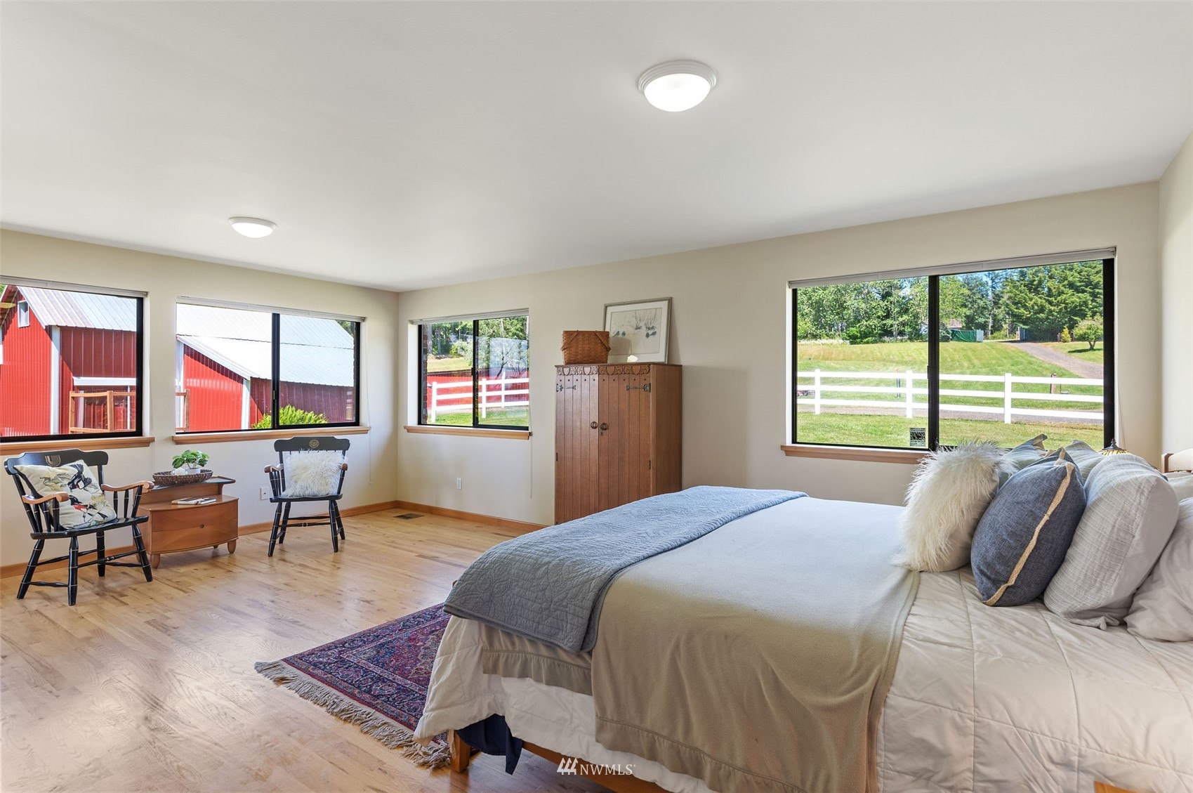 17510 88th Street Southwest Longbranch, WA 98351 - Photo 22 of 40 a bedroom with a bed furniture and a window