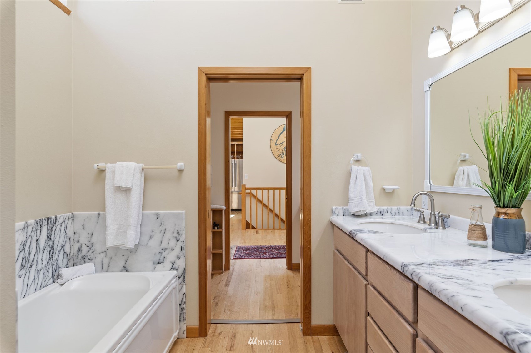 17510 88th Street Southwest Longbranch, WA 98351 - Photo 23 of 40 a en suite bathroom with a granite countertop sink and a bathtub