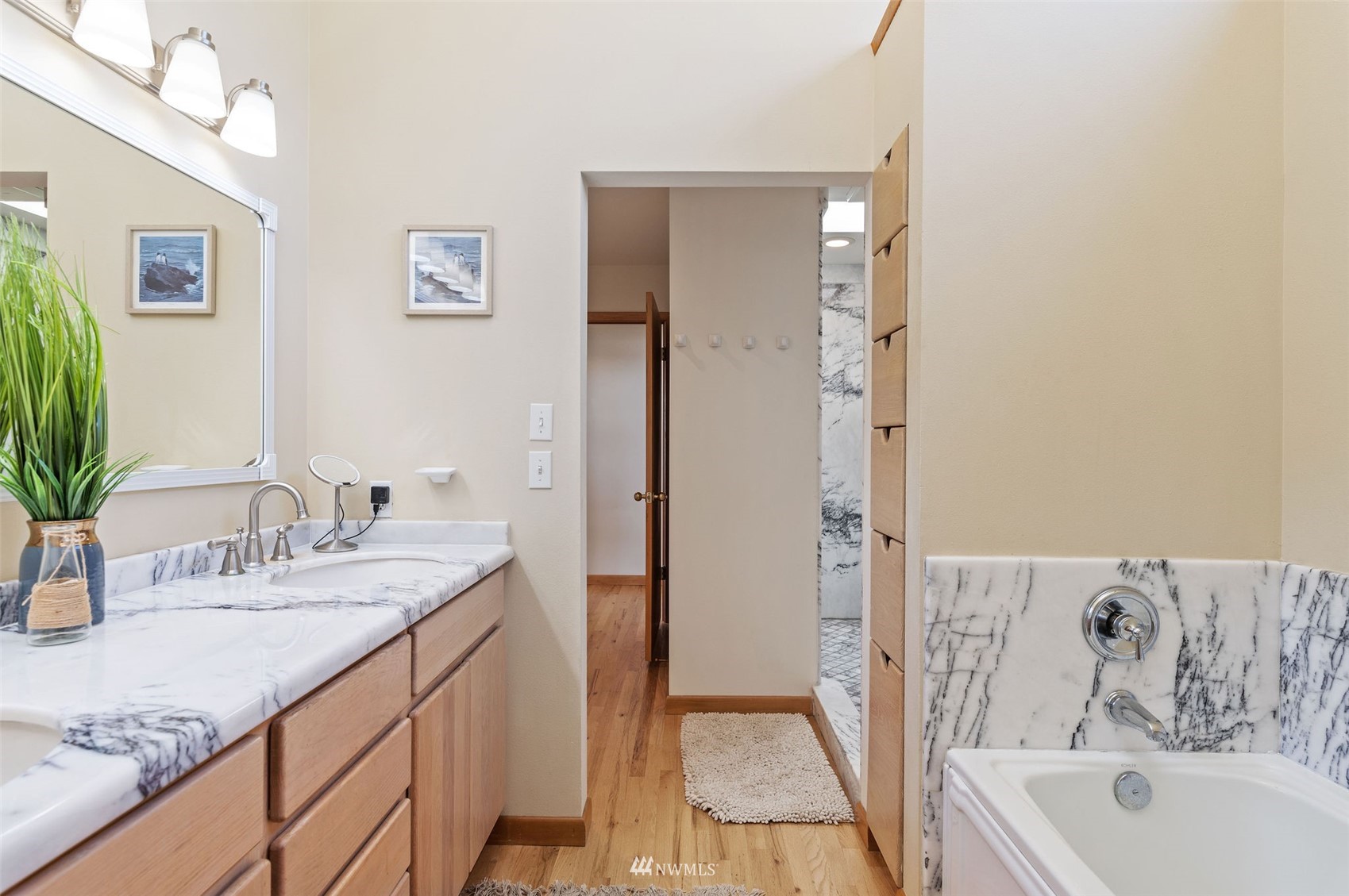 17510 88th Street Southwest Longbranch, WA 98351 - Photo 24 of 40 a bathroom with a granite countertop sink and a mirror
