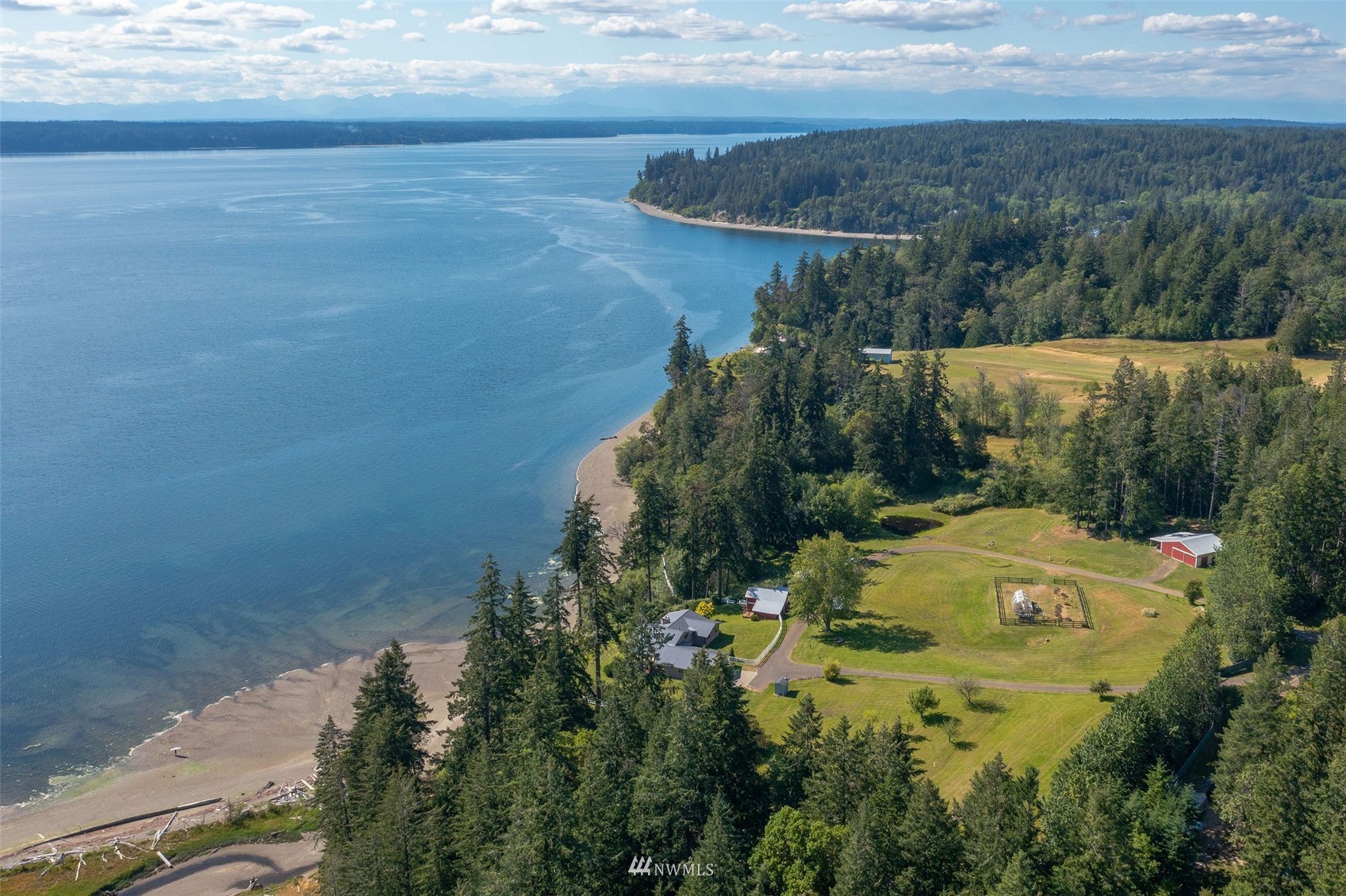 17510 88th Street Southwest Longbranch, WA 98351 - Photo 3 of 40 a view of a lake with a yard