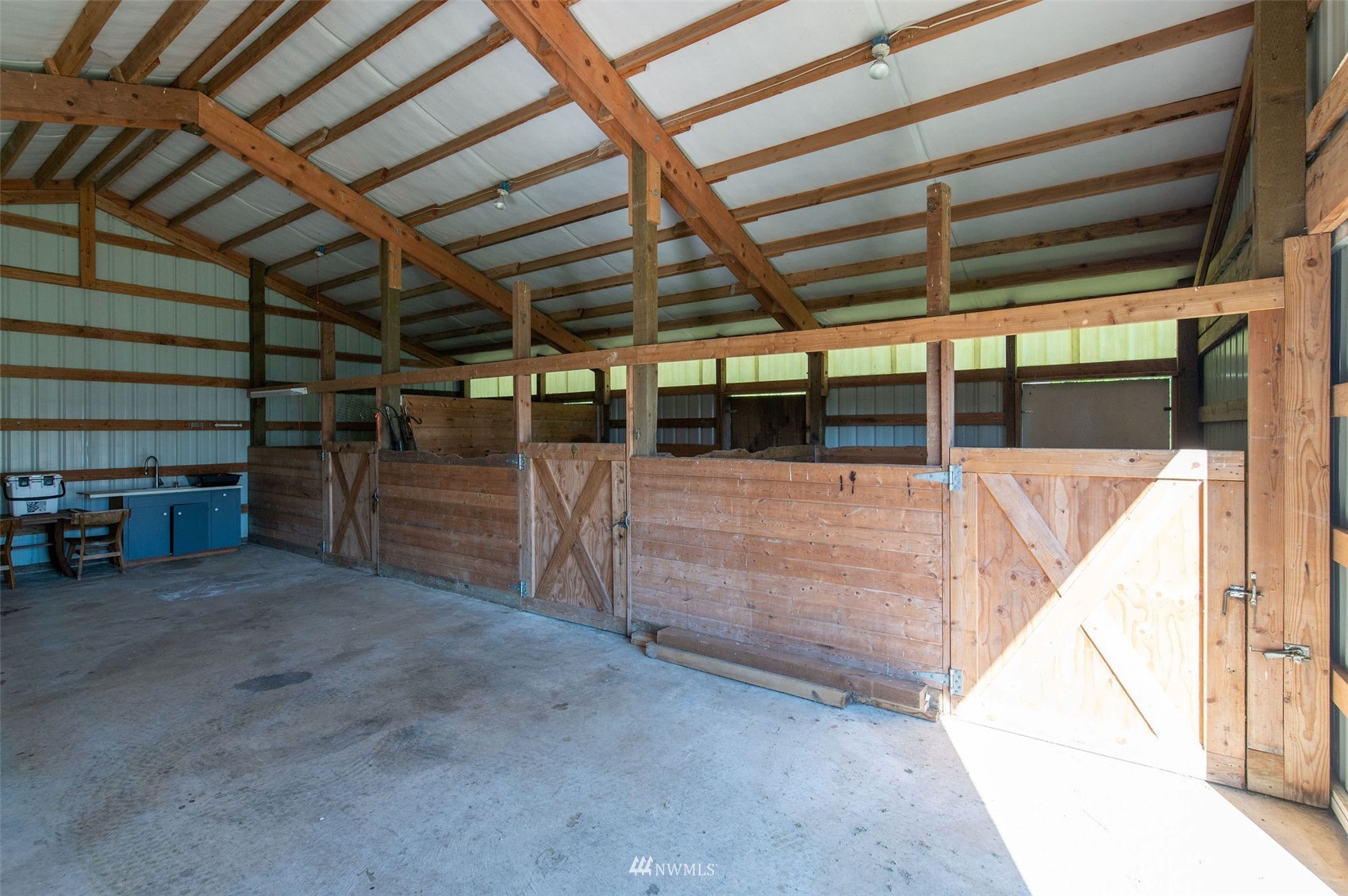 17510 88th Street Southwest Longbranch, WA 98351 - Photo 35 of 40 a view of a empty room with storage