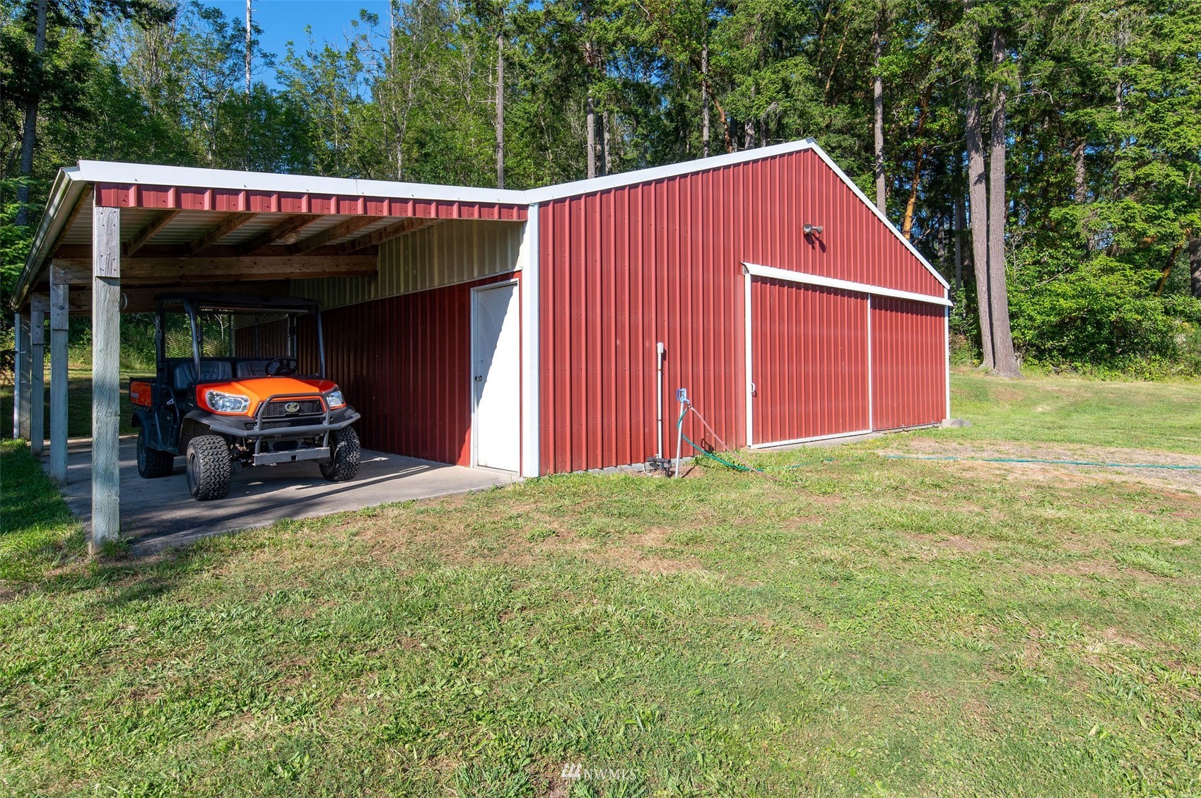 17510 88th Street Southwest Longbranch, WA 98351 - Photo 36 of 40 a front view of house with yard and trees all around