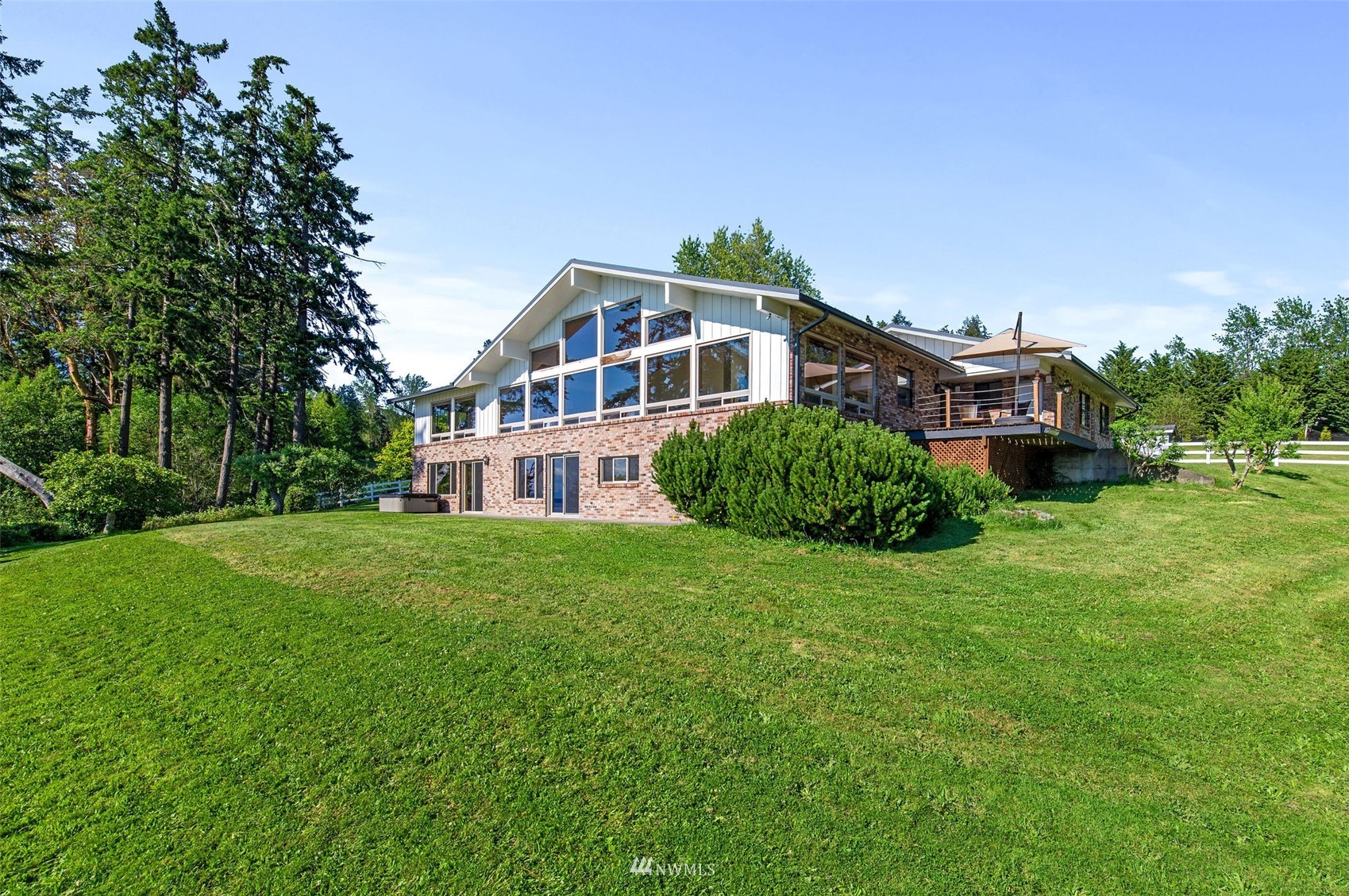 17510 88th Street Southwest Longbranch, WA 98351 - Photo 9 of 40 a front view of a house with a garden
