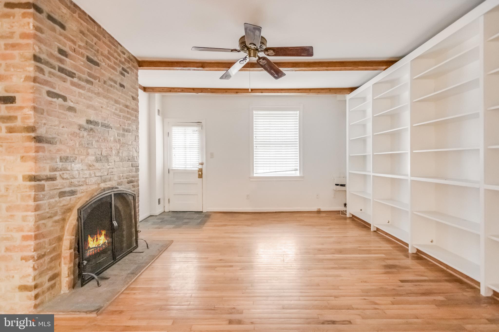 107 15th Street Northeast Washington, DC 20002 - Photo 14 of 30 a view of empty room with a fireplace and wooden floor