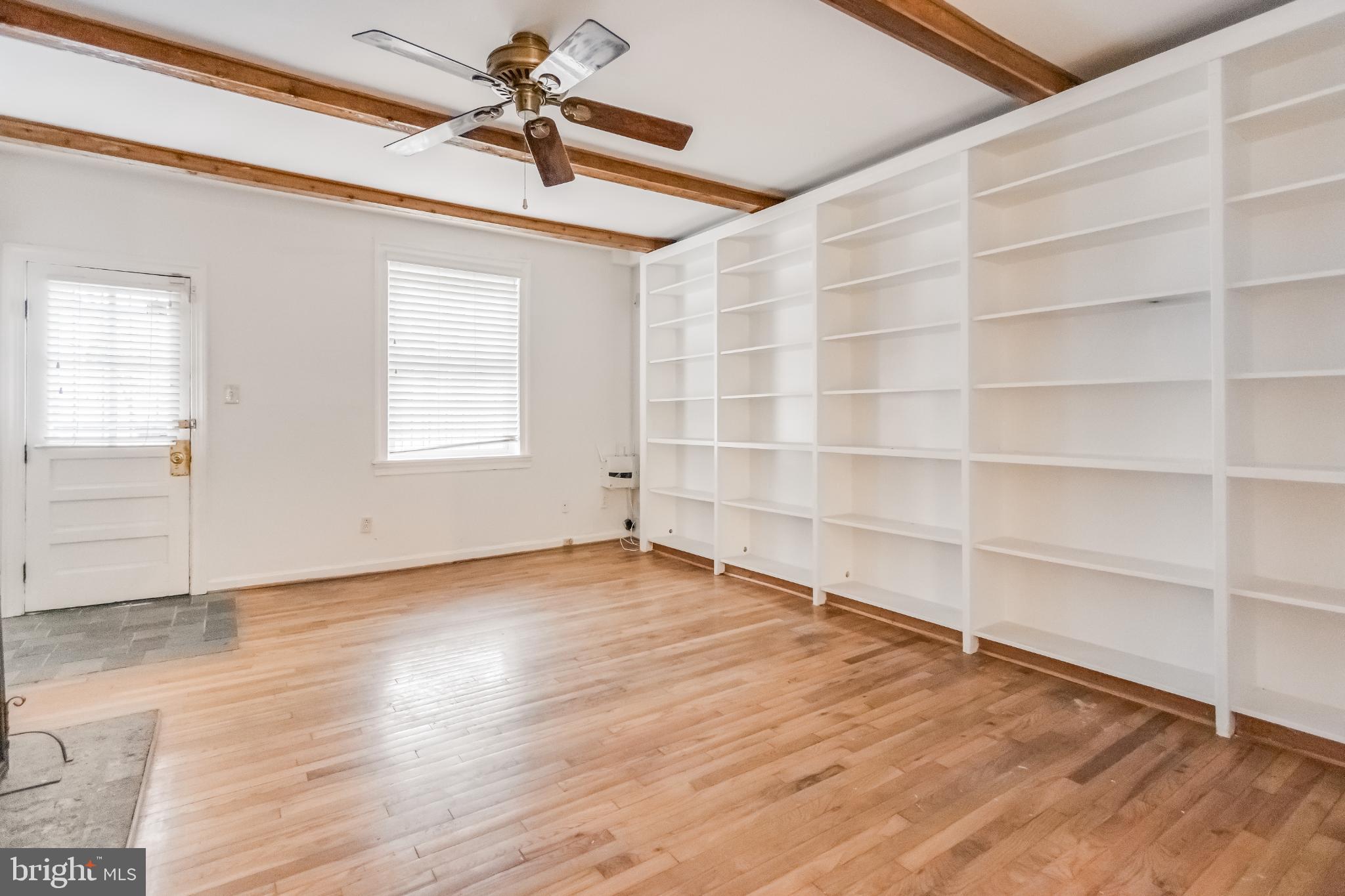 107 15th Street Northeast Washington, DC 20002 - Photo 17 of 30 a view of an empty room with a window and wooden floor