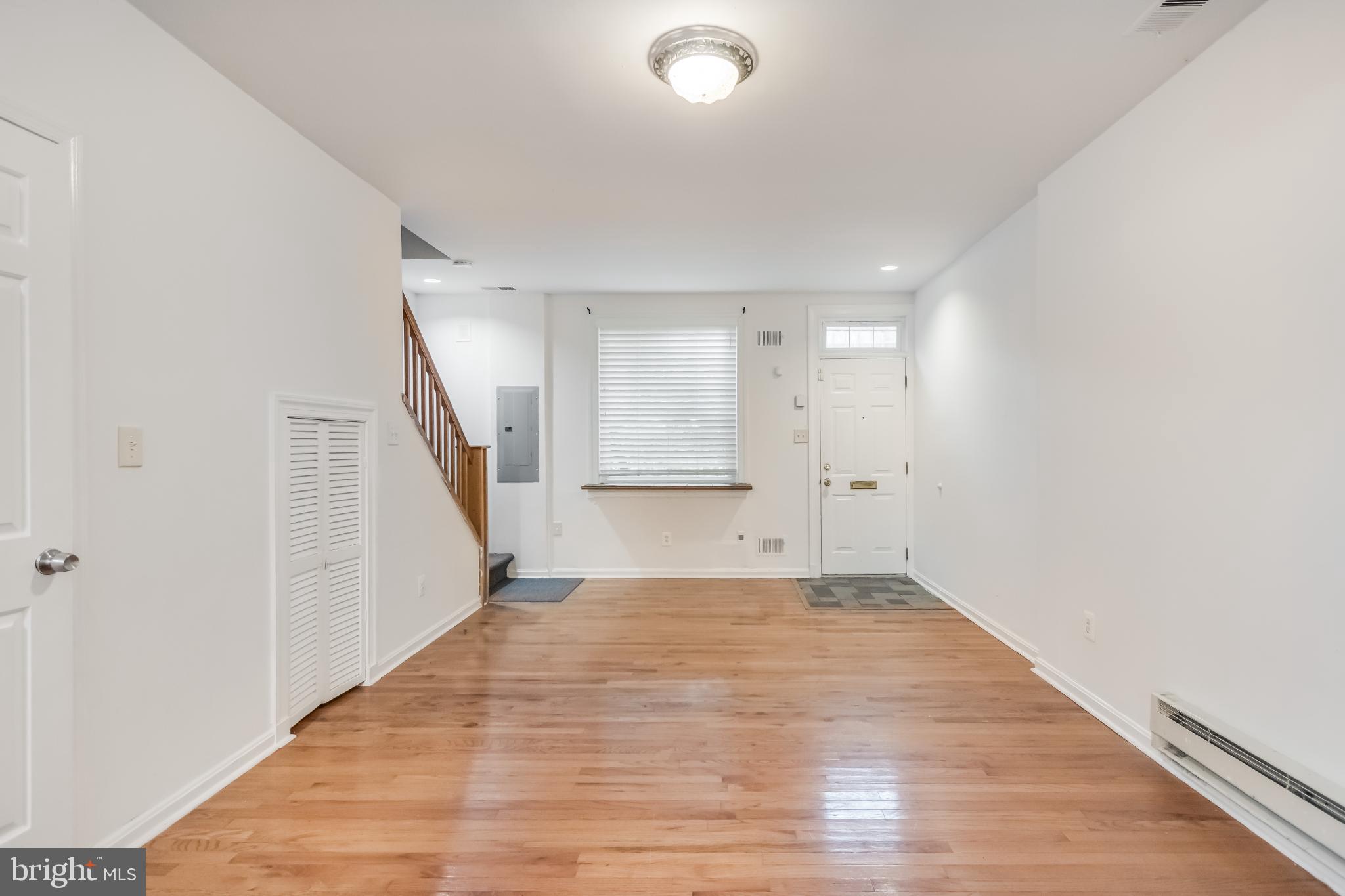 107 15th Street Northeast Washington, DC 20002 - Photo 4 of 30 a view of an empty room with wooden floor