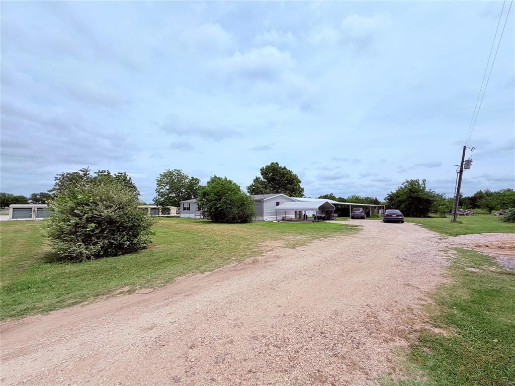 3789 Jacobs Lane Kaufman, TX 75142 - Photo 29 of 33 a view of a street with houses on both side of it