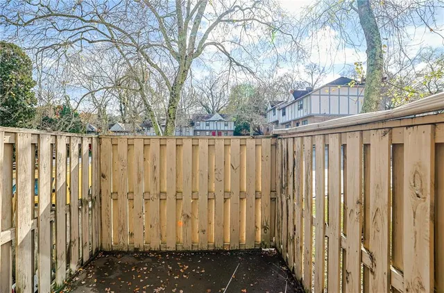 a view of a wooden fence