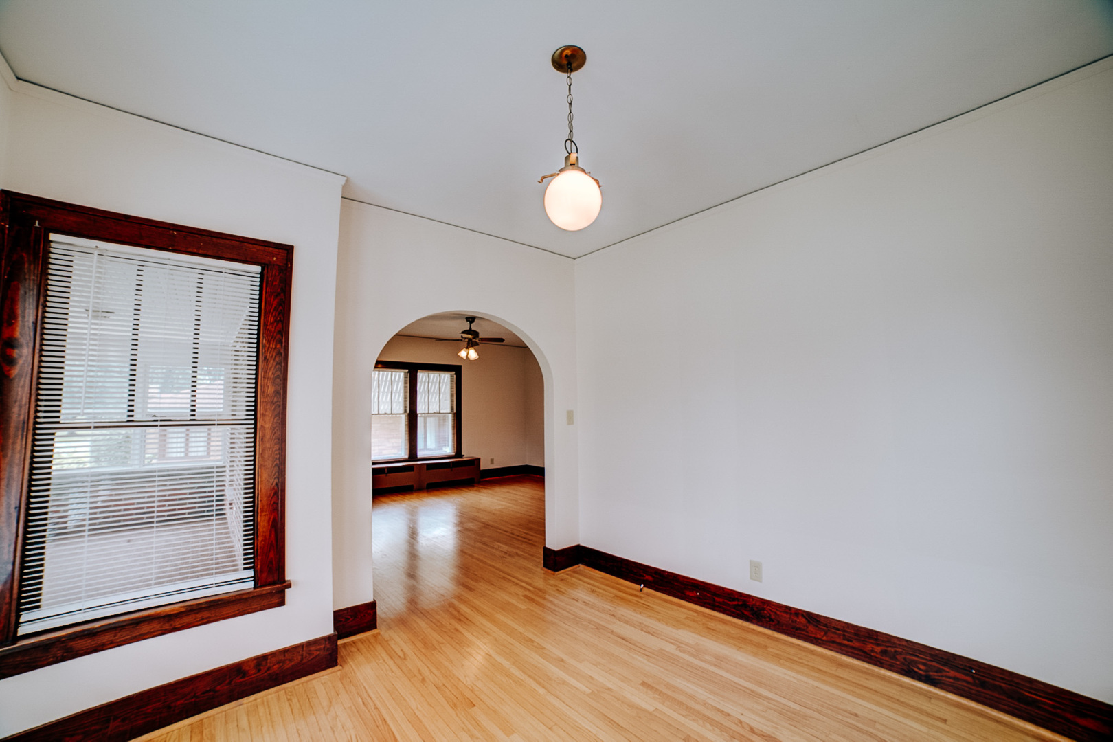 317 South 4th Street Watseka, IL 60970 - Photo 13 of 40 wooden floor in an empty room with a window