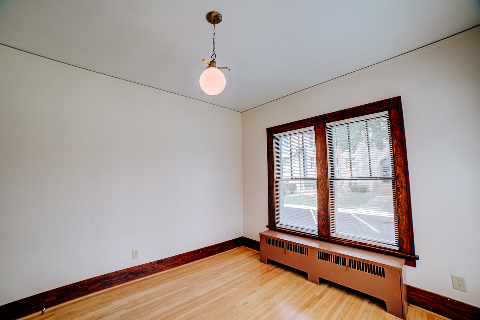 317 South 4th Street Watseka, IL 60970 - Photo 14 of 40 a view of room with window and wooden floor