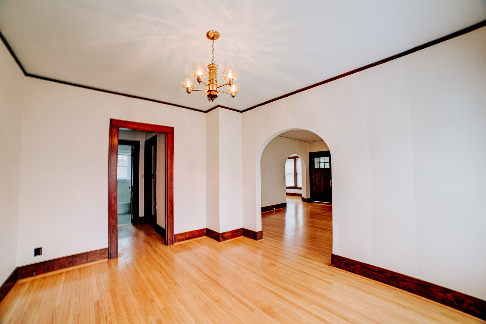 317 South 4th Street Watseka, IL 60970 - Photo 16 of 40 wooden floor in an empty room with a window