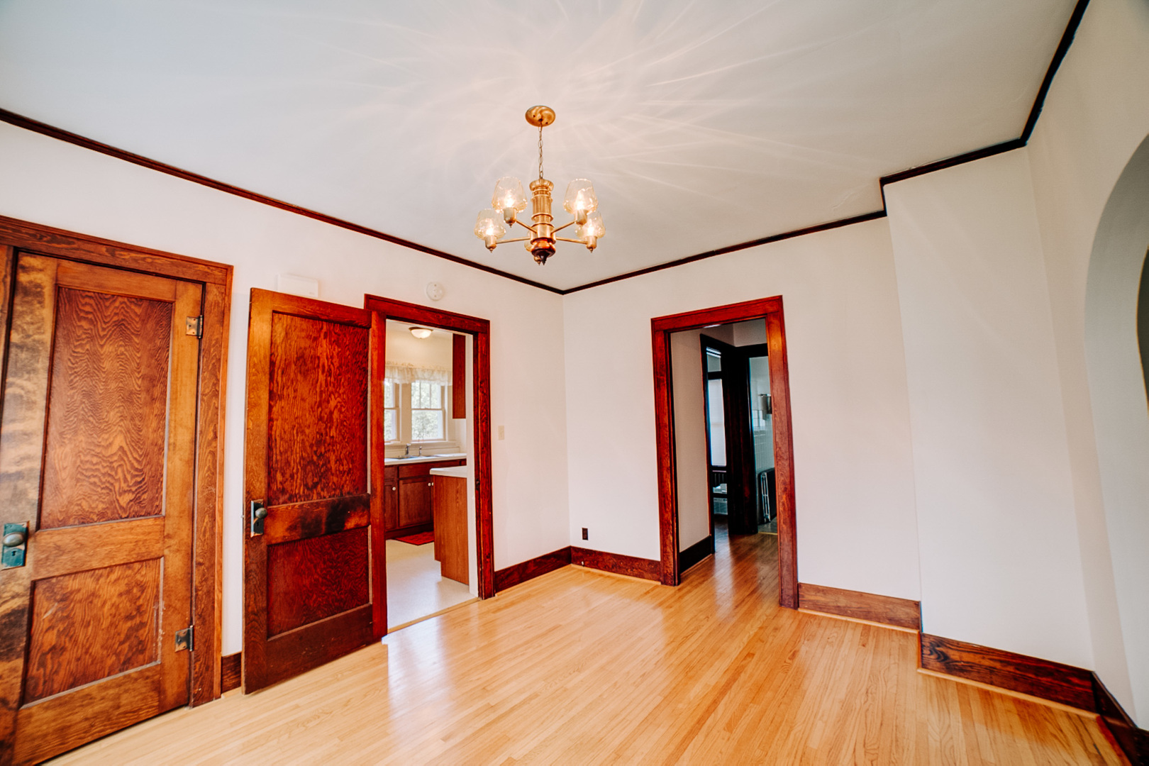 317 South 4th Street Watseka, IL 60970 - Photo 17 of 40 wooden floor in an empty room with a window