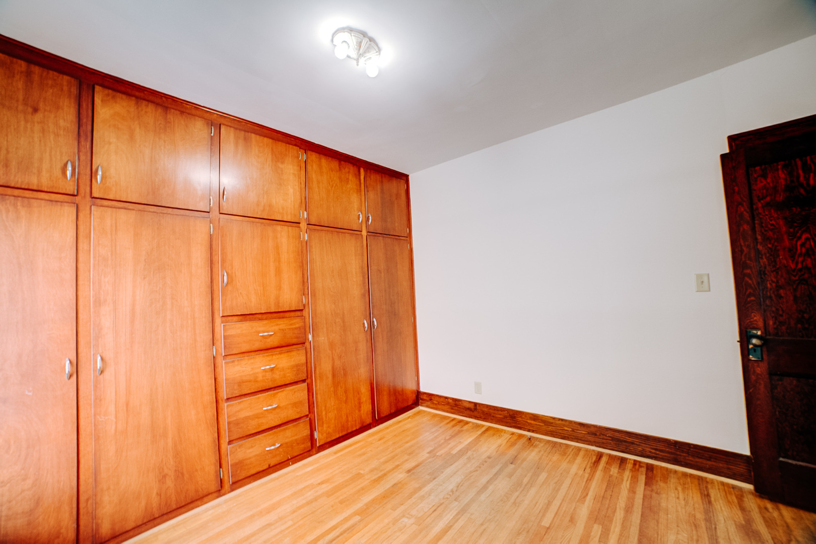 317 South 4th Street Watseka, IL 60970 - Photo 26 of 40 a view of empty room with wooden floor
