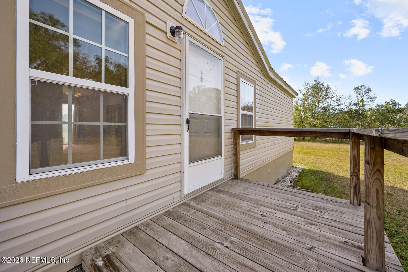 305 Palmetto Bluff Road Palatka, FL 32177 - Photo 22 of 34 Front Deck Entance