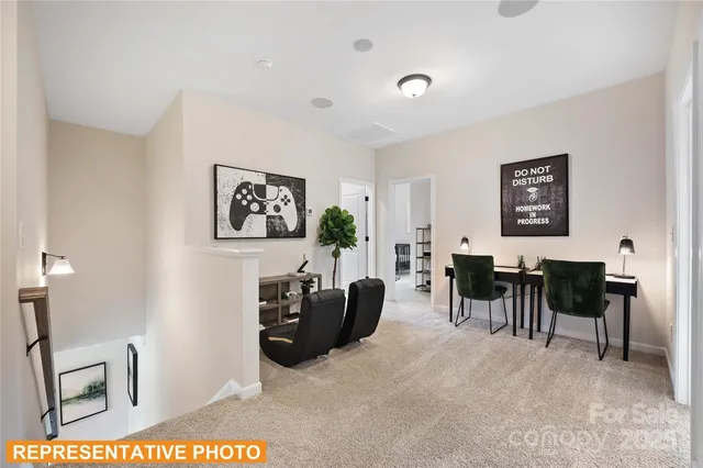 a spacious bedroom with a bed and a dresser