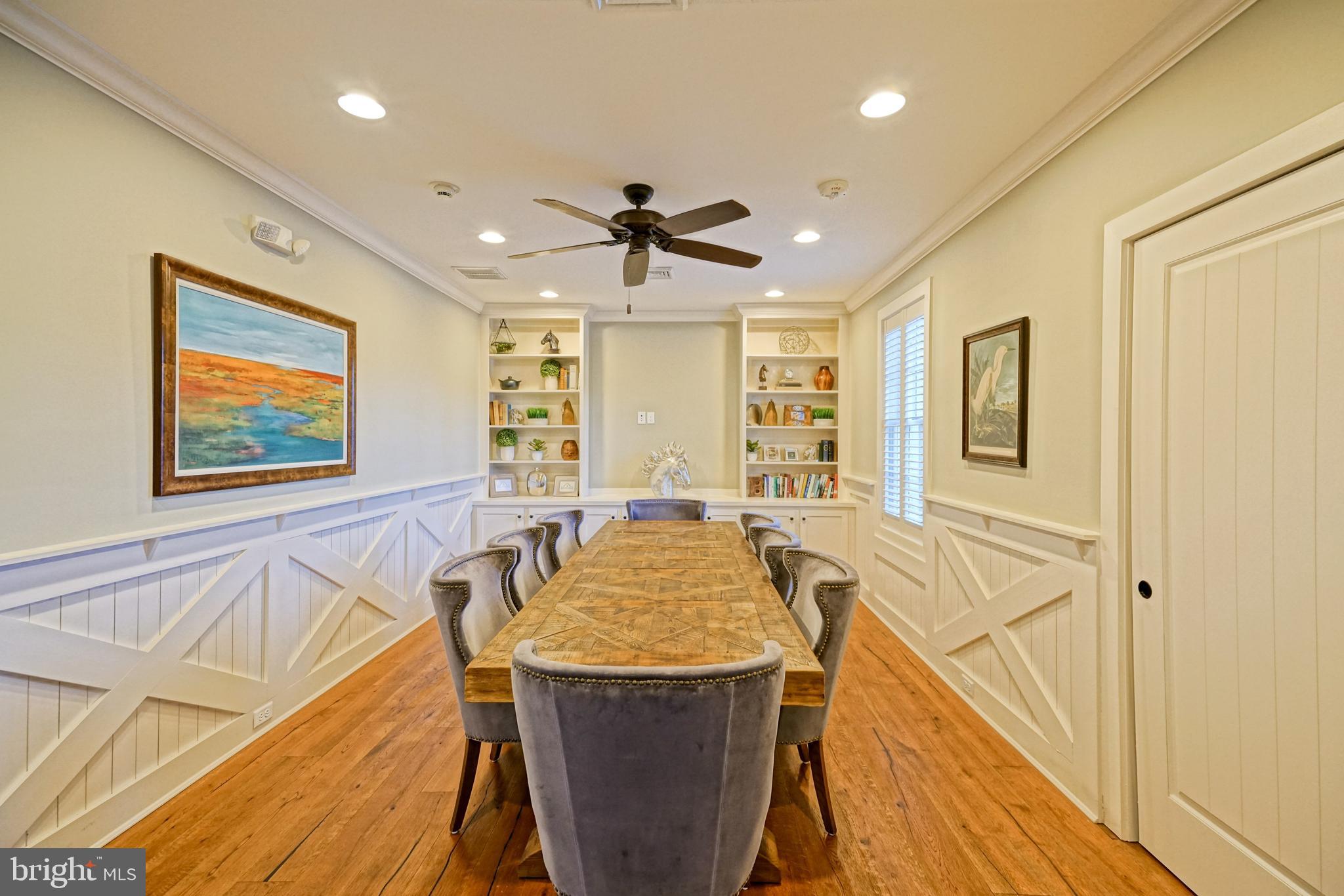 36903 Crossrail Way Lewes, DE 19958 - Photo 119 of 120 a view of a dining room with furniture window and wooden floor
