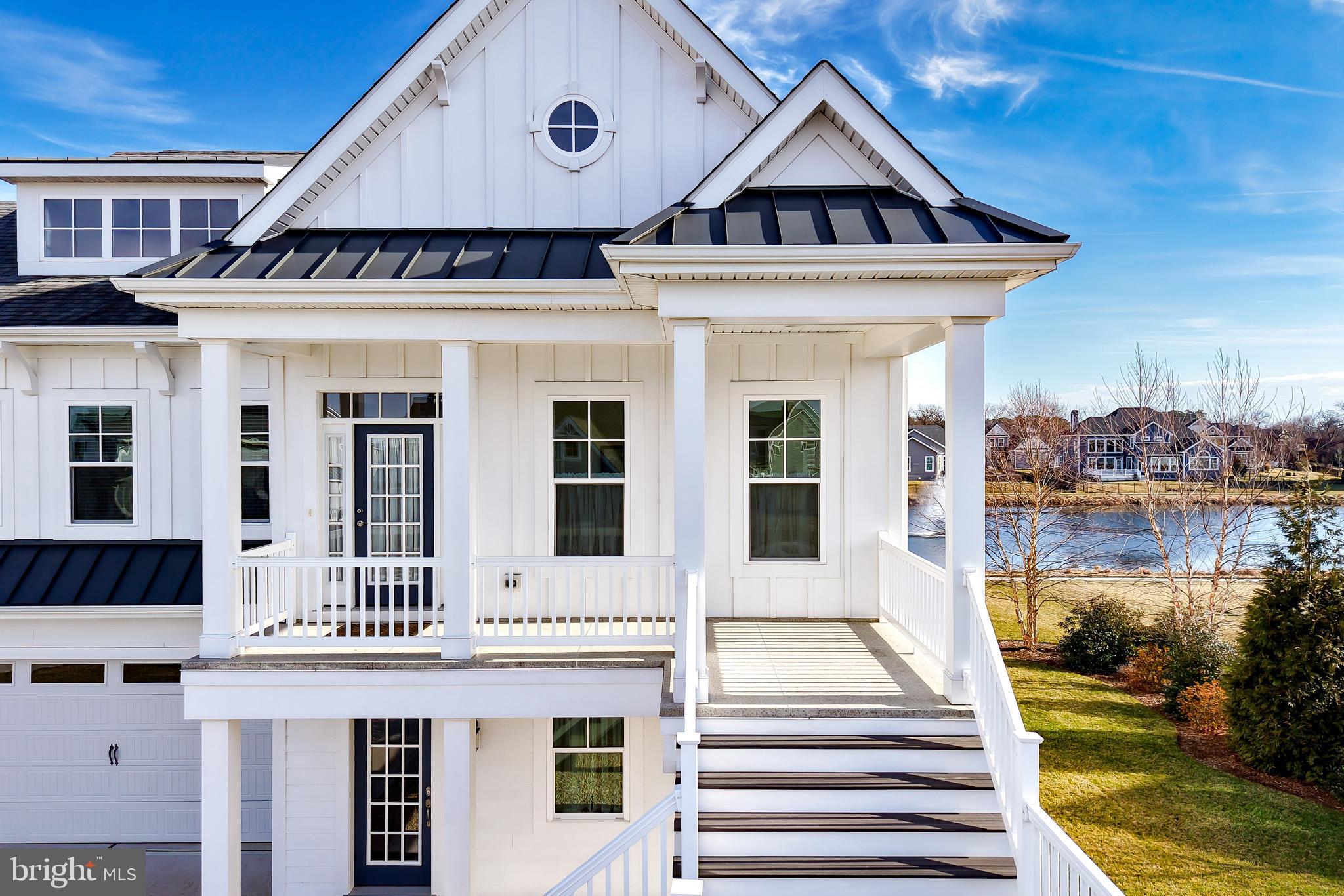 36903 Crossrail Way Lewes, DE 19958 - Photo 4 of 120 a front view of a house with a yard