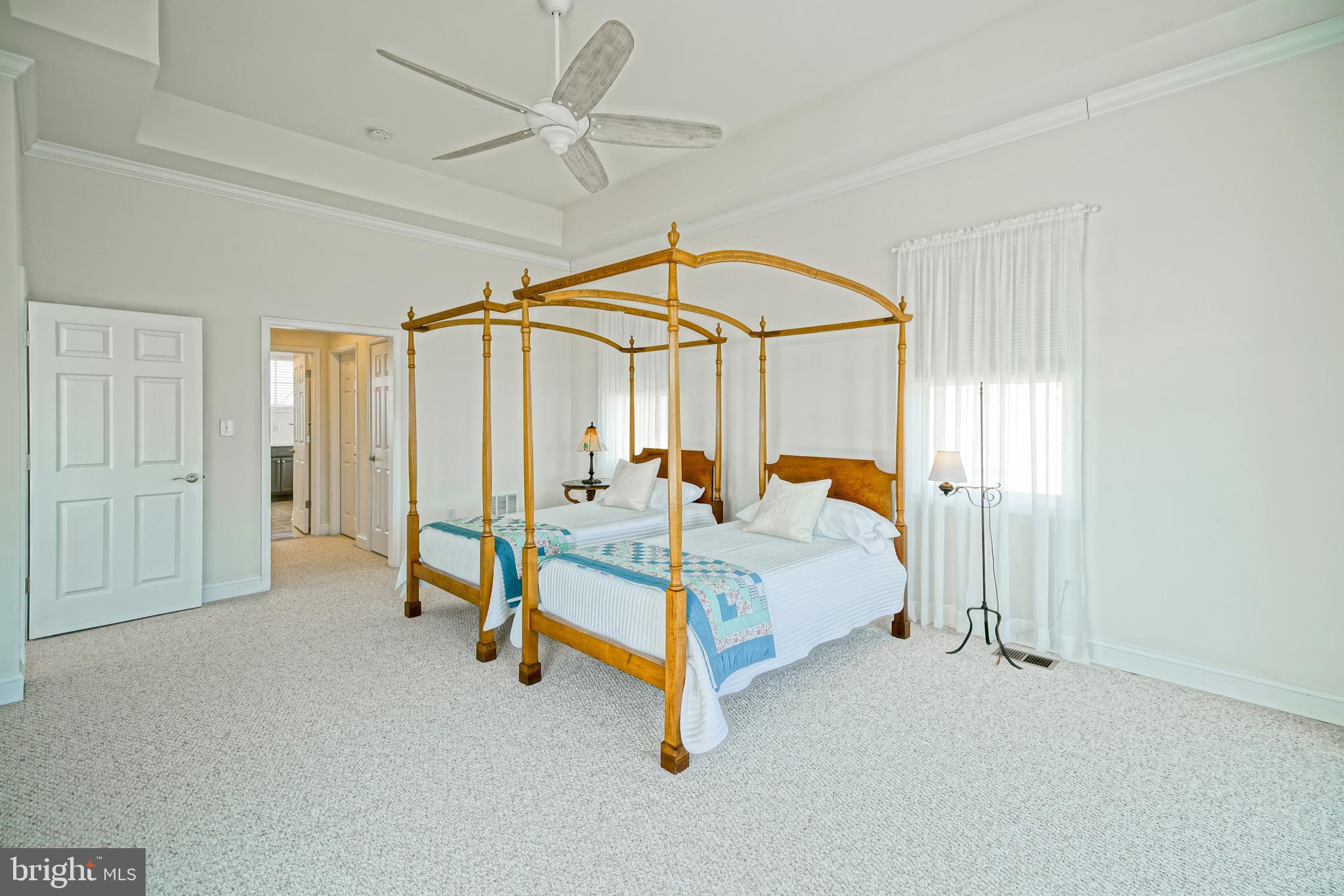 36903 Crossrail Way Lewes, DE 19958 - Photo 49 of 120 a bed room with furniture and a ceiling fan