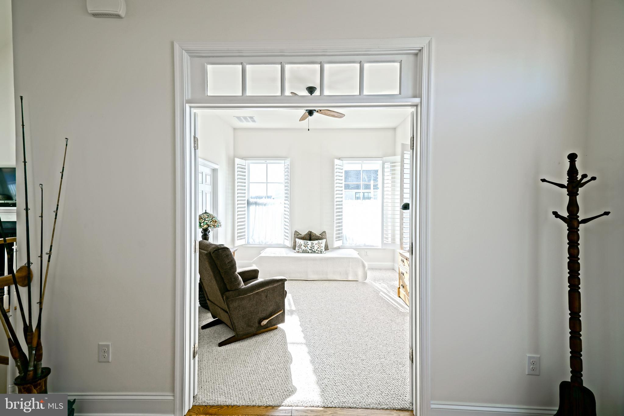 36903 Crossrail Way Lewes, DE 19958 - Photo 7 of 120 a living room with furniture and a window
