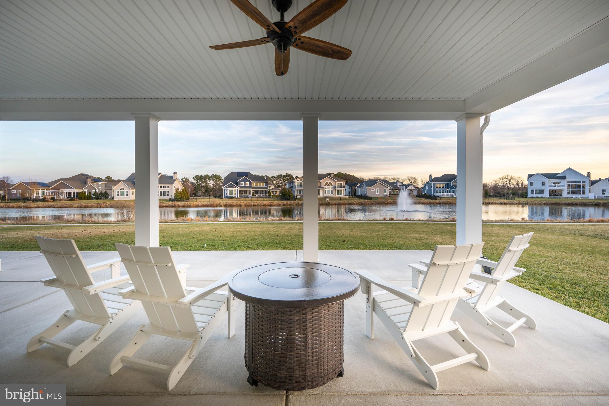 36903 Crossrail Way Lewes, DE 19958 - Photo 91 of 120 a view of a swimming pool and outdoor seating space