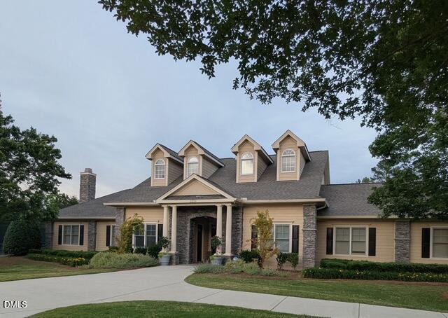 3541 Fairstone Road Wake Forest, NC 27587 - Photo 38 of 39 a front view of a house with garden