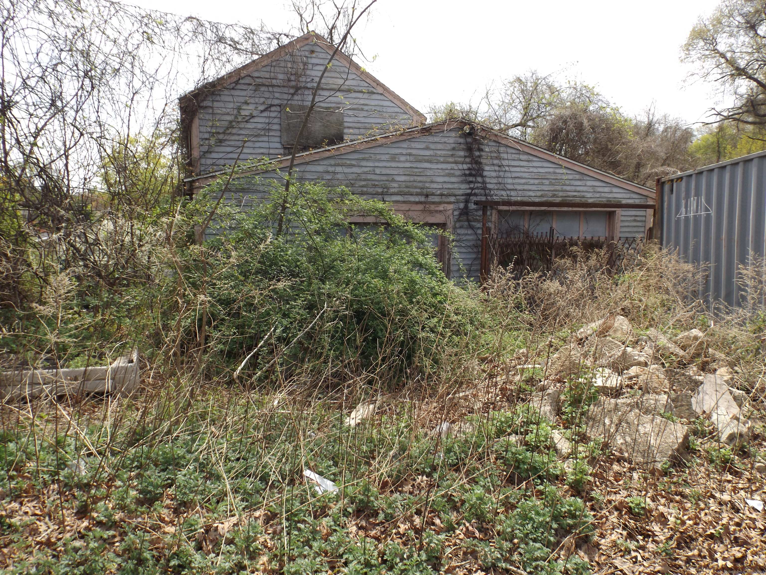 213 Exeter Street Bridgeport, CT 06606 - Photo 2 of 12 a view of a backyard