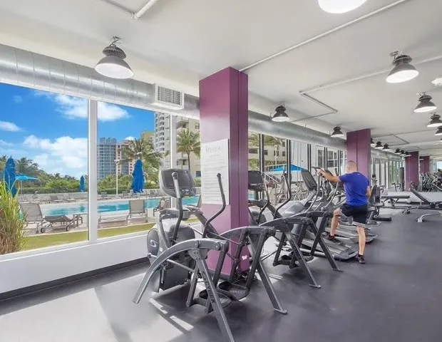 a view of a room with gym equipment