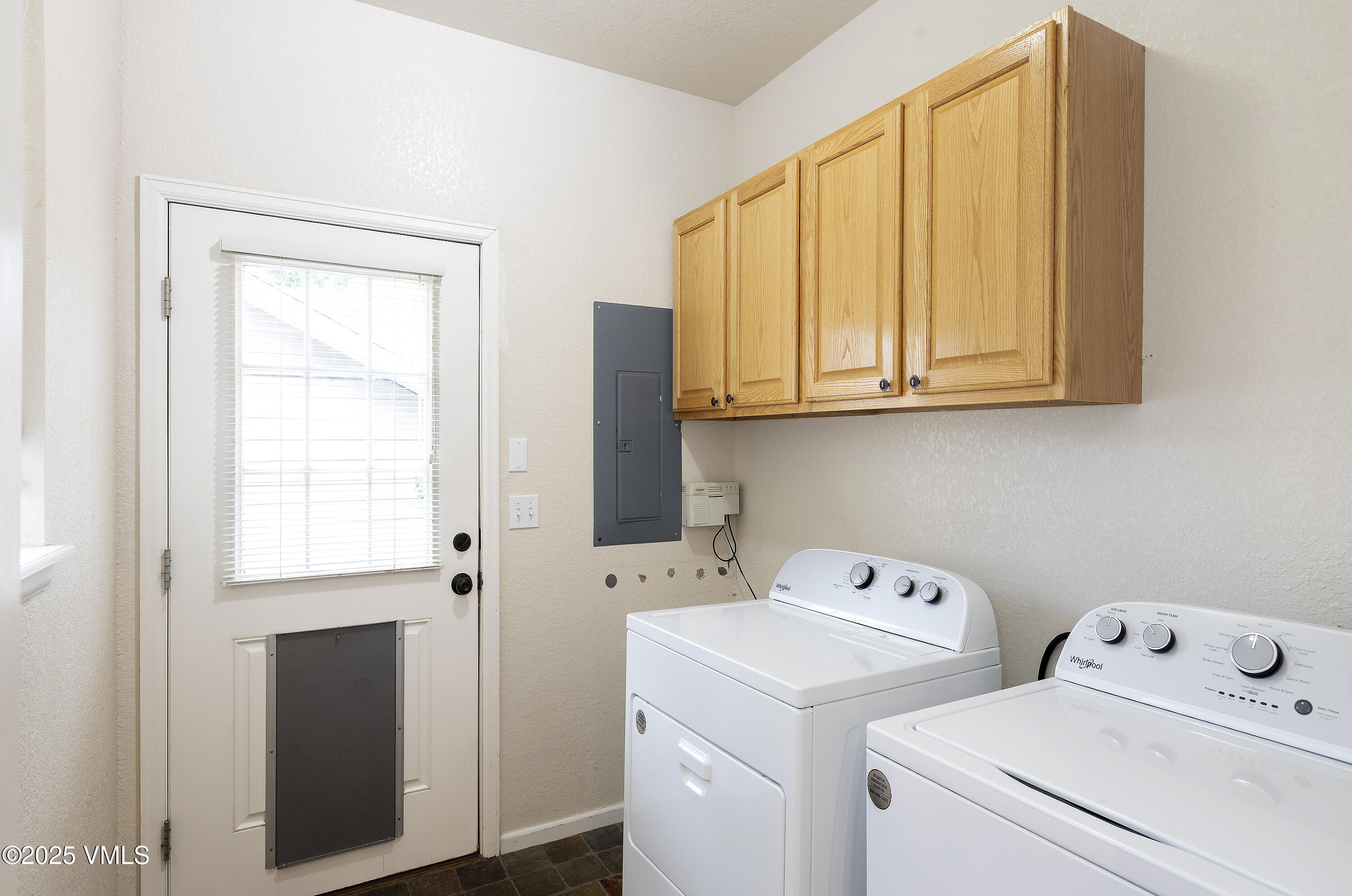 95 Eagle Ranch Road Eagle, CO 81631 - Photo 16 of 31 a view of storage and utility room with washer and dryer