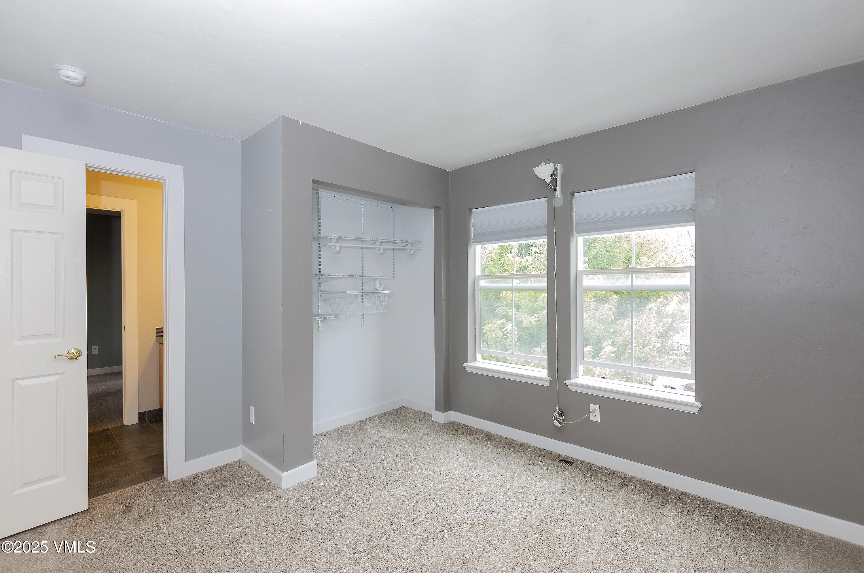 95 Eagle Ranch Road Eagle, CO 81631 - Photo 24 of 31 a view of an empty room with a window