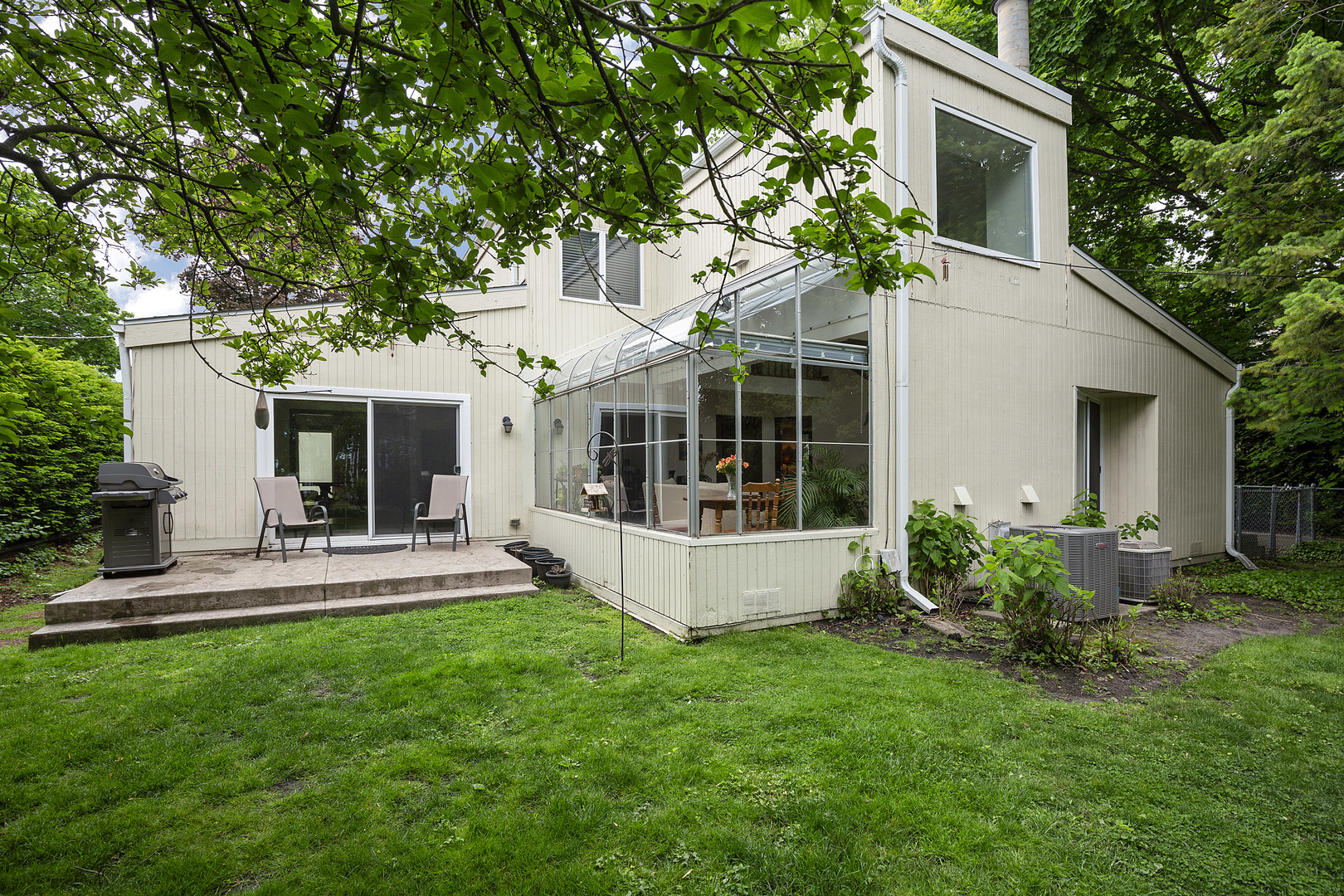 2653 Sheridan Road Evanston, IL 60201 - Photo 1 of 17 a view of a house with a yard and sitting area